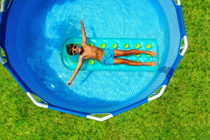 Boy,Swim,On,Inflatable,Matrass,View,From,Above